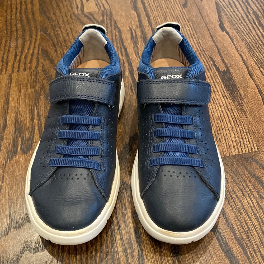 Youth navy blue geox sneaker style shoe. Size 33 European / size 2.5 US
